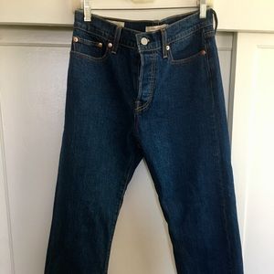 Levi’s raw hem cropped jeans.